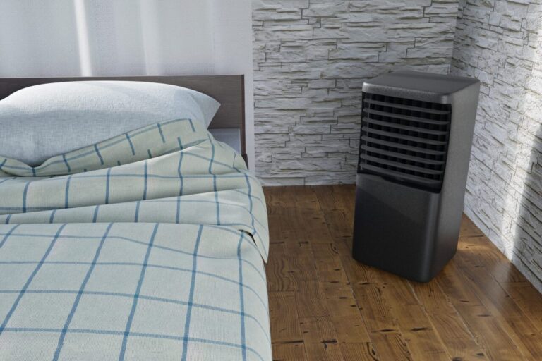 Climatiseur monobloc installé dans une chambre sous combles pour rafraîchir l’espace sans groupe extérieur.